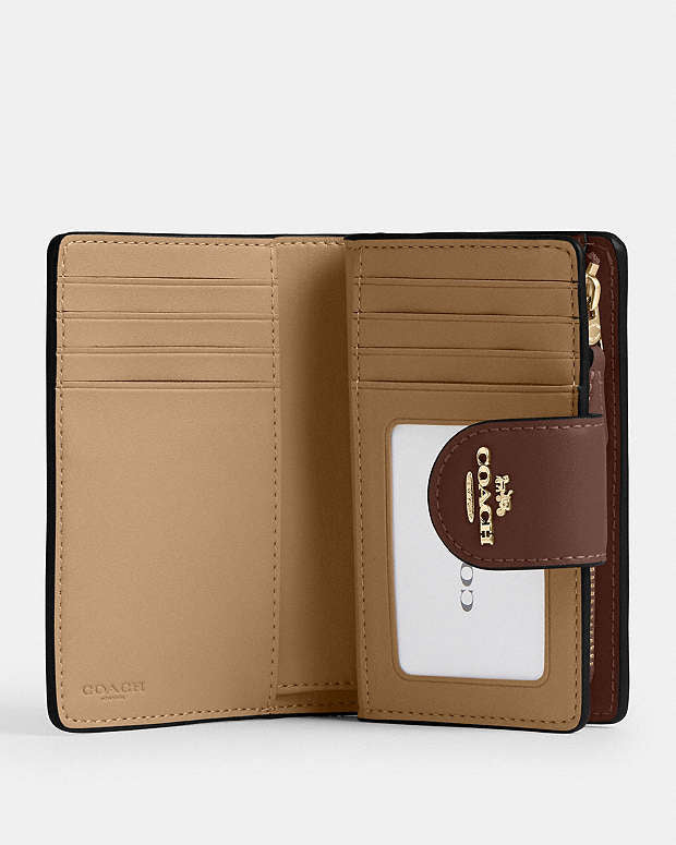 Coach medium corner zip wallet