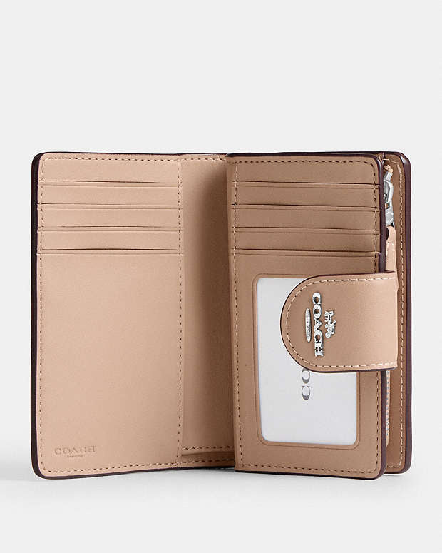 Coach medium corner zip wallet