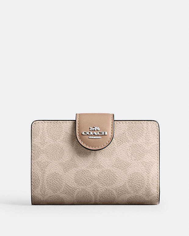 Coach medium corner zip wallet